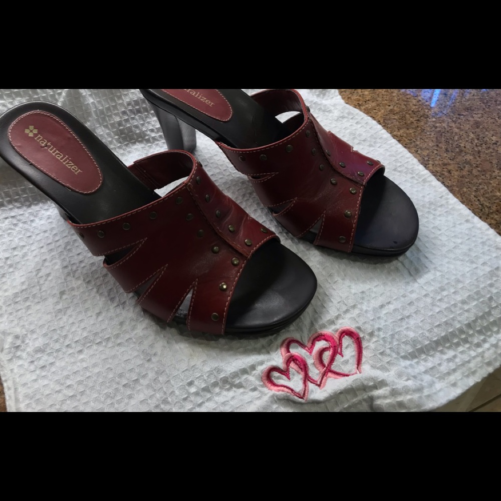 Ladies red leather heeled sandal with round studs